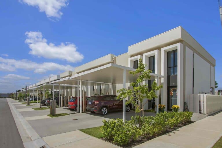 Insulated carports as part of a residential development designed and installed by Truline