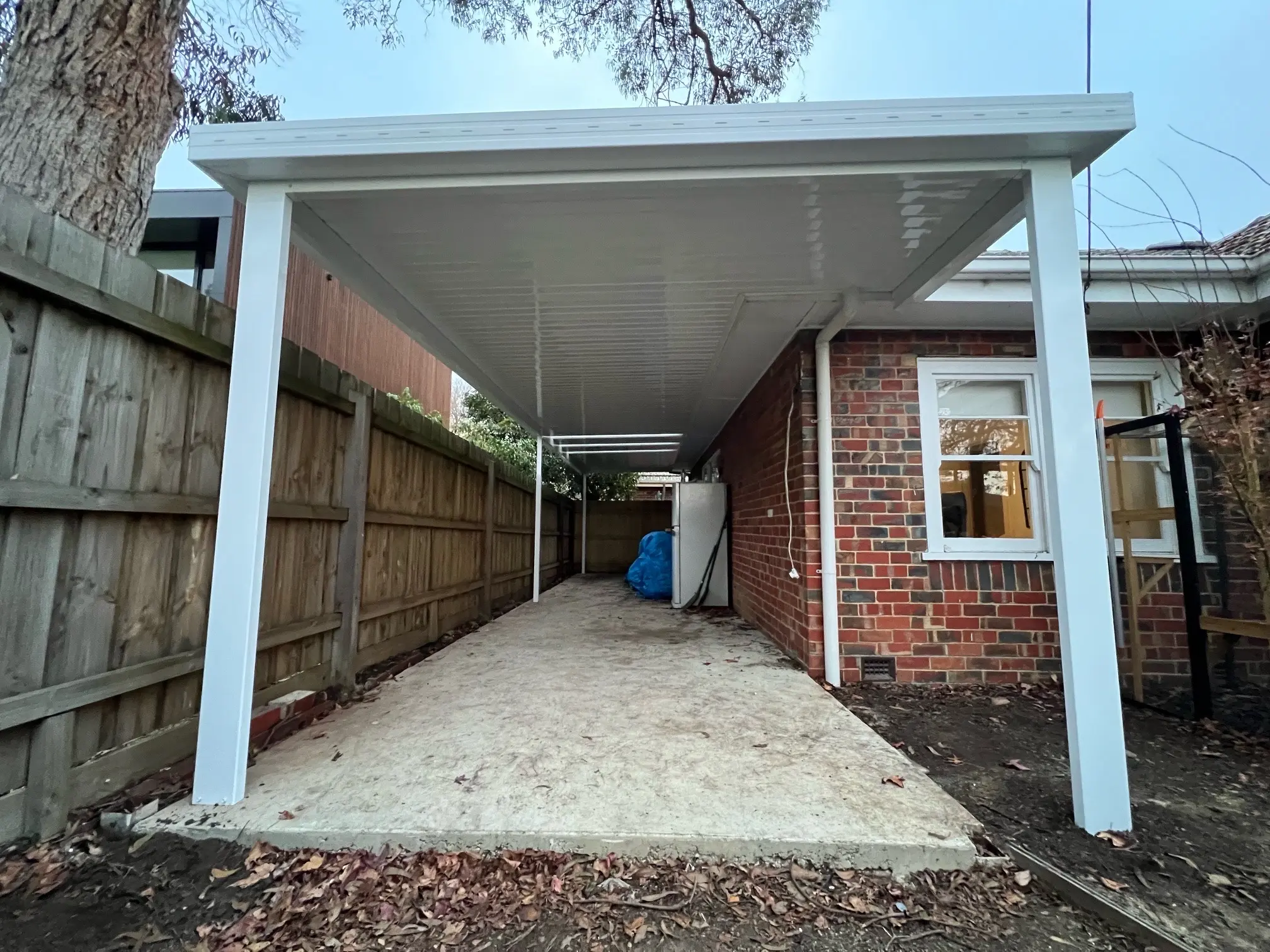 Steel caport designed and built by the Mebourne Team.