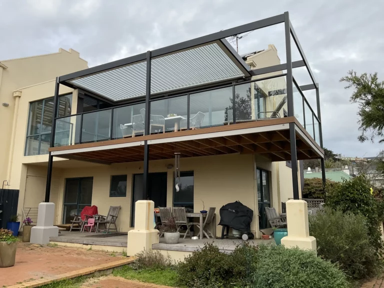 A recently designed and constructed 2nd storey louvred pergola completed by our Melbourne outdoor roofing team in Frankston.